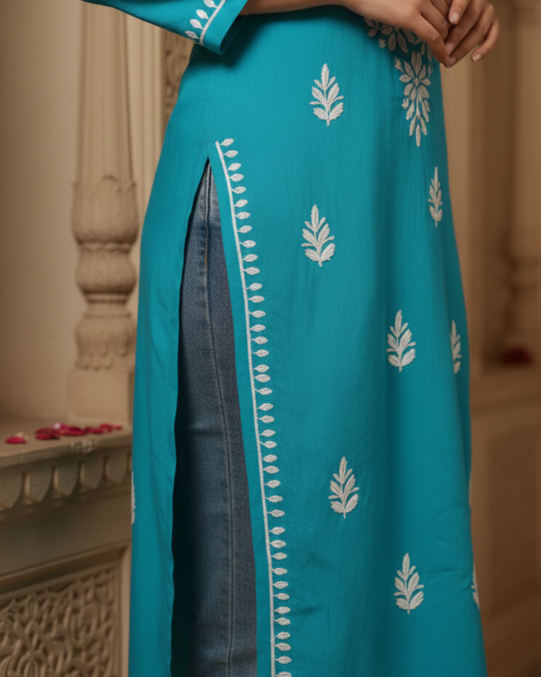 Turquoise Blue Rayon Kurti With White Embroidery.