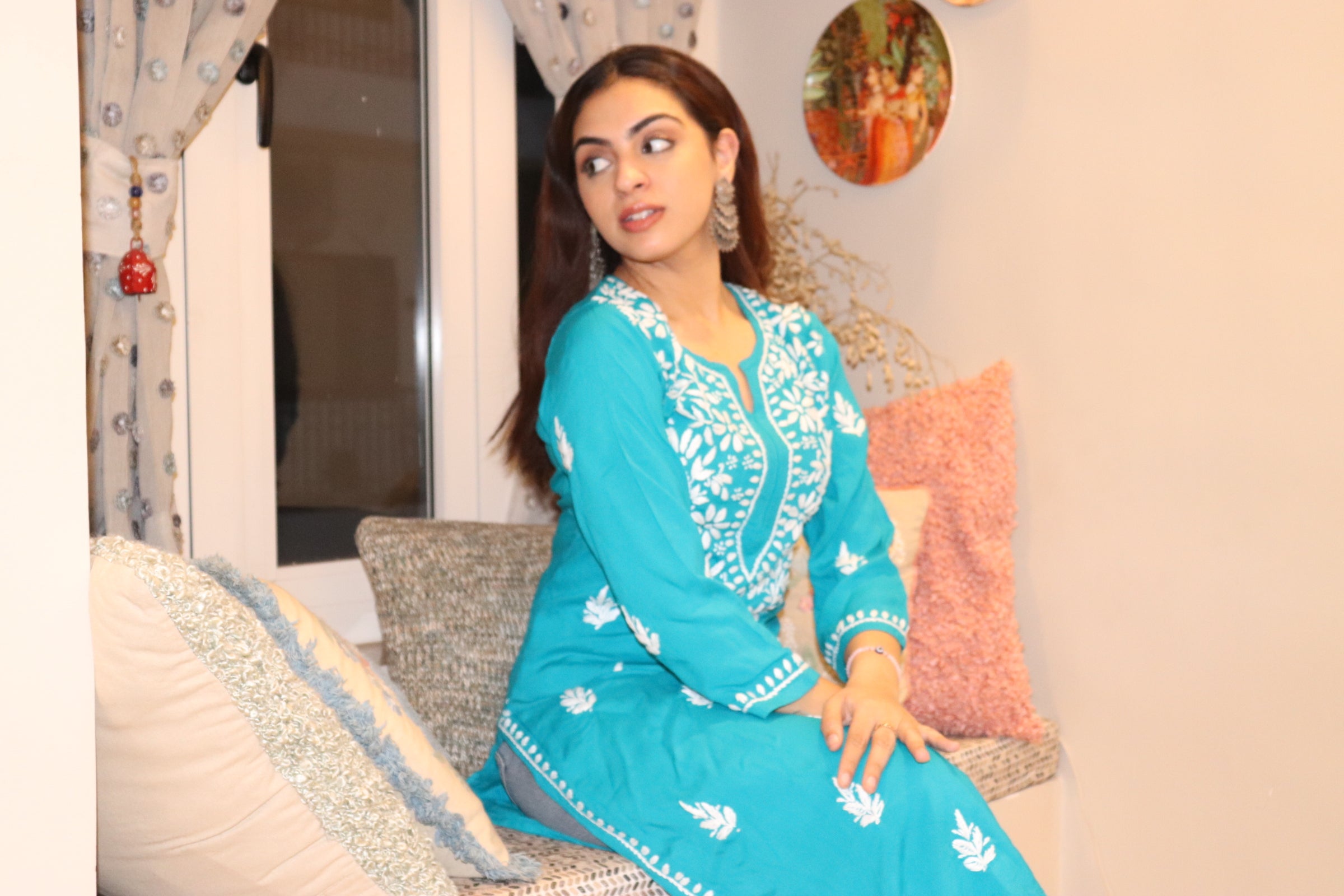 Turquoise Blue Rayon Kurti With White Embroidery.