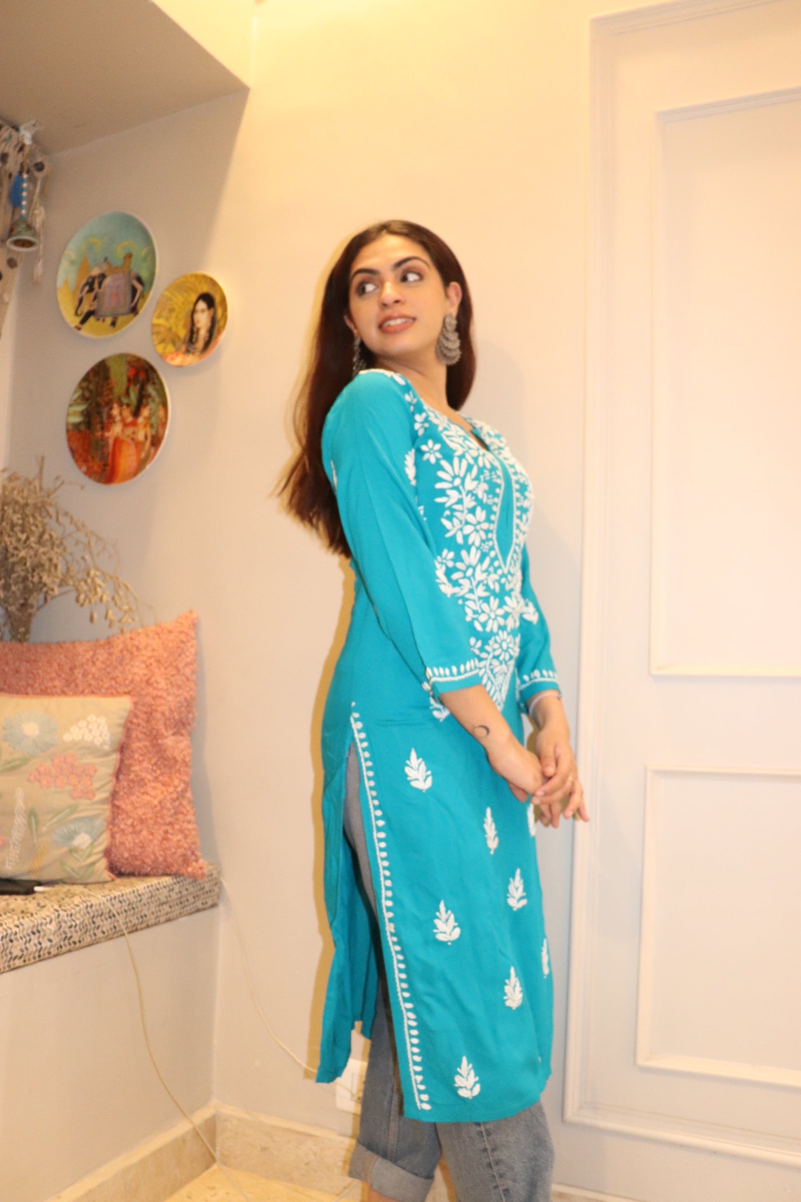 Turquoise Blue Rayon Kurti With White Embroidery.
