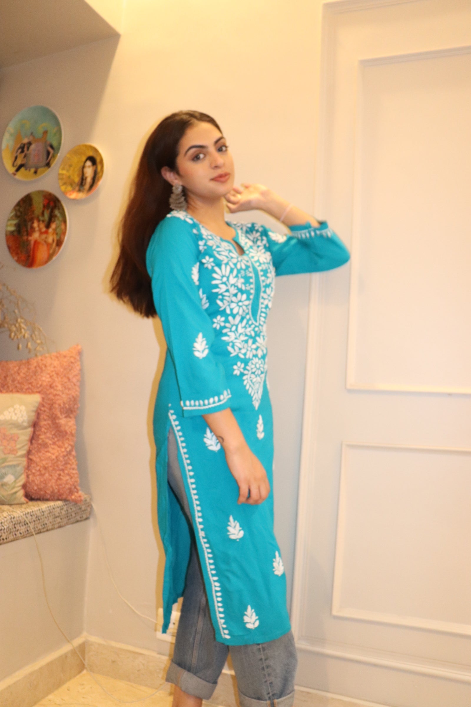 Turquoise Blue Rayon Kurti With White Embroidery.