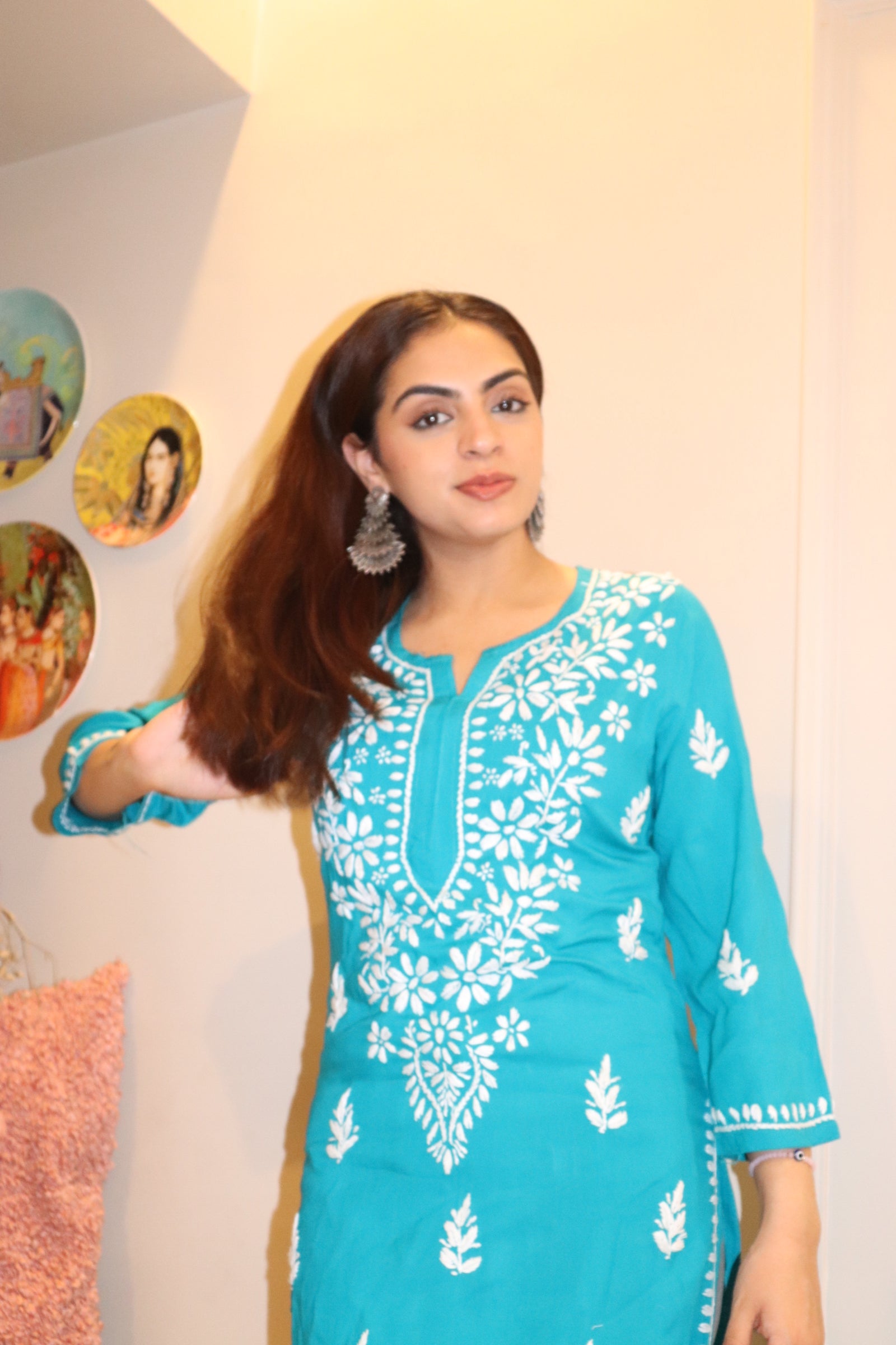 Turquoise Blue Rayon Kurti With White Embroidery.