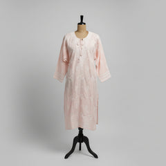 A pink Pure Cotton Chikankari Suit Set displayed on a mannequin, consisting of a kurta, matching bottoms, and a dupatta.