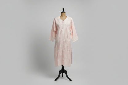 A pink Pure Cotton Chikankari Suit Set displayed on a mannequin, consisting of a kurta, matching bottoms, and a dupatta.