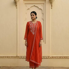 Nazaarat Mulchanderi Semistitched Orange Suit With Swarovski Pearl Work